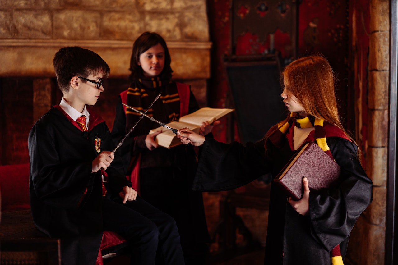 Harry and his friend practice magic by wand