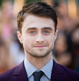 Daniel Radcliffe is wearing suit