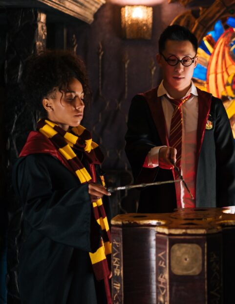 Some students use wand to make a spell
